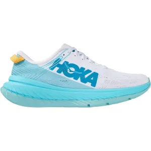 Women's Carbon X running with a GPS watch running in a suburban area shoes