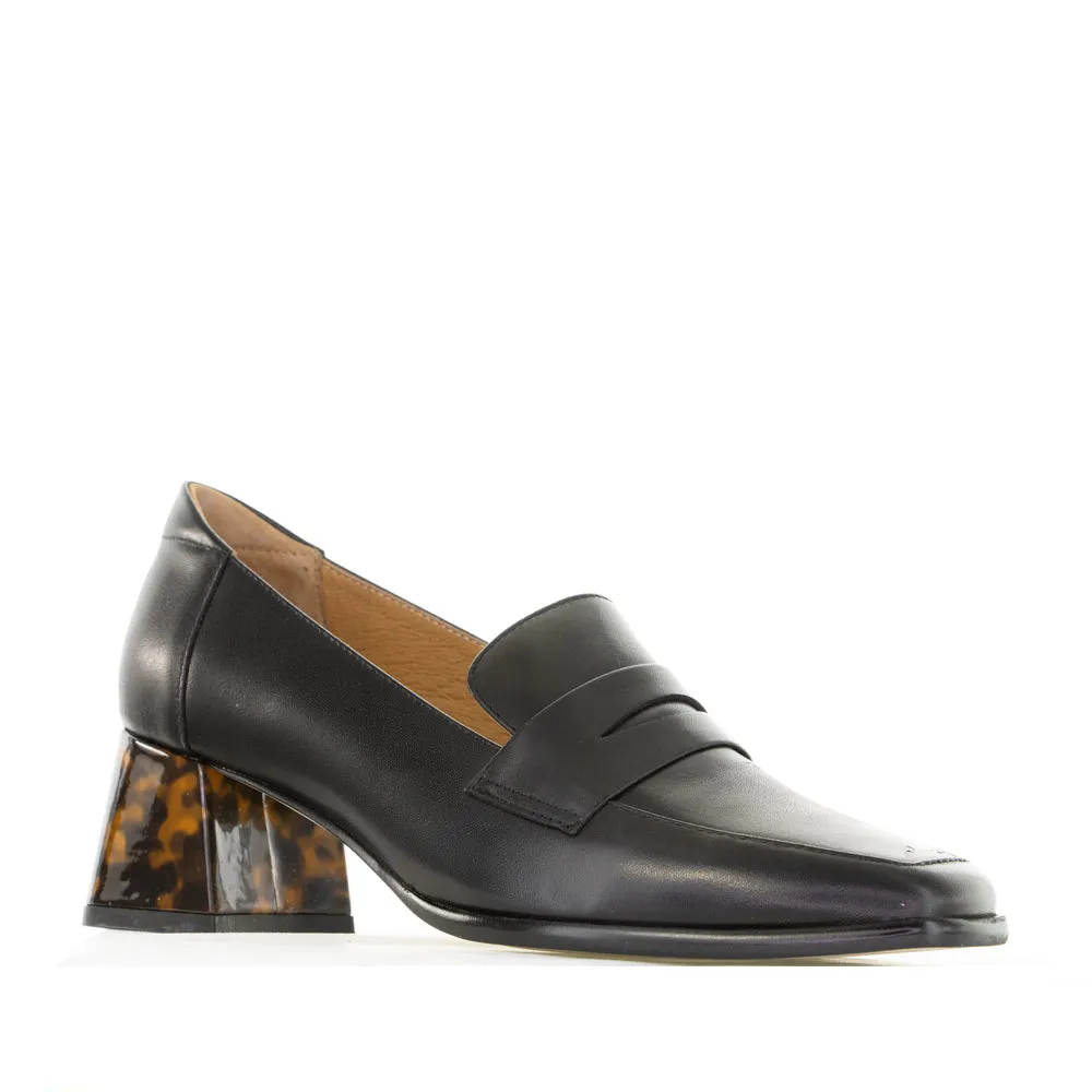 BRESLEY PAVON BLACK Bold materials